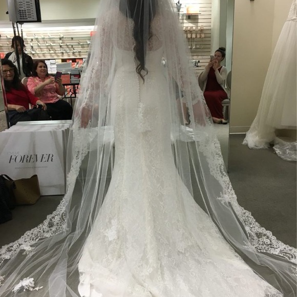 Dresses & Skirts - Lace long sleeve wedding dress. Never altered.